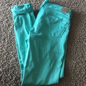 American Eagle teal skinny jeans