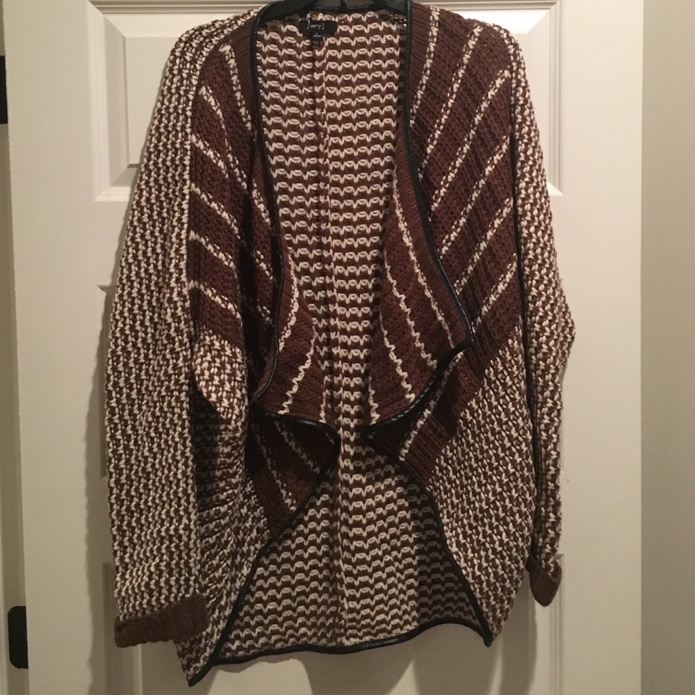 Brown and cream sweater lined in black leather