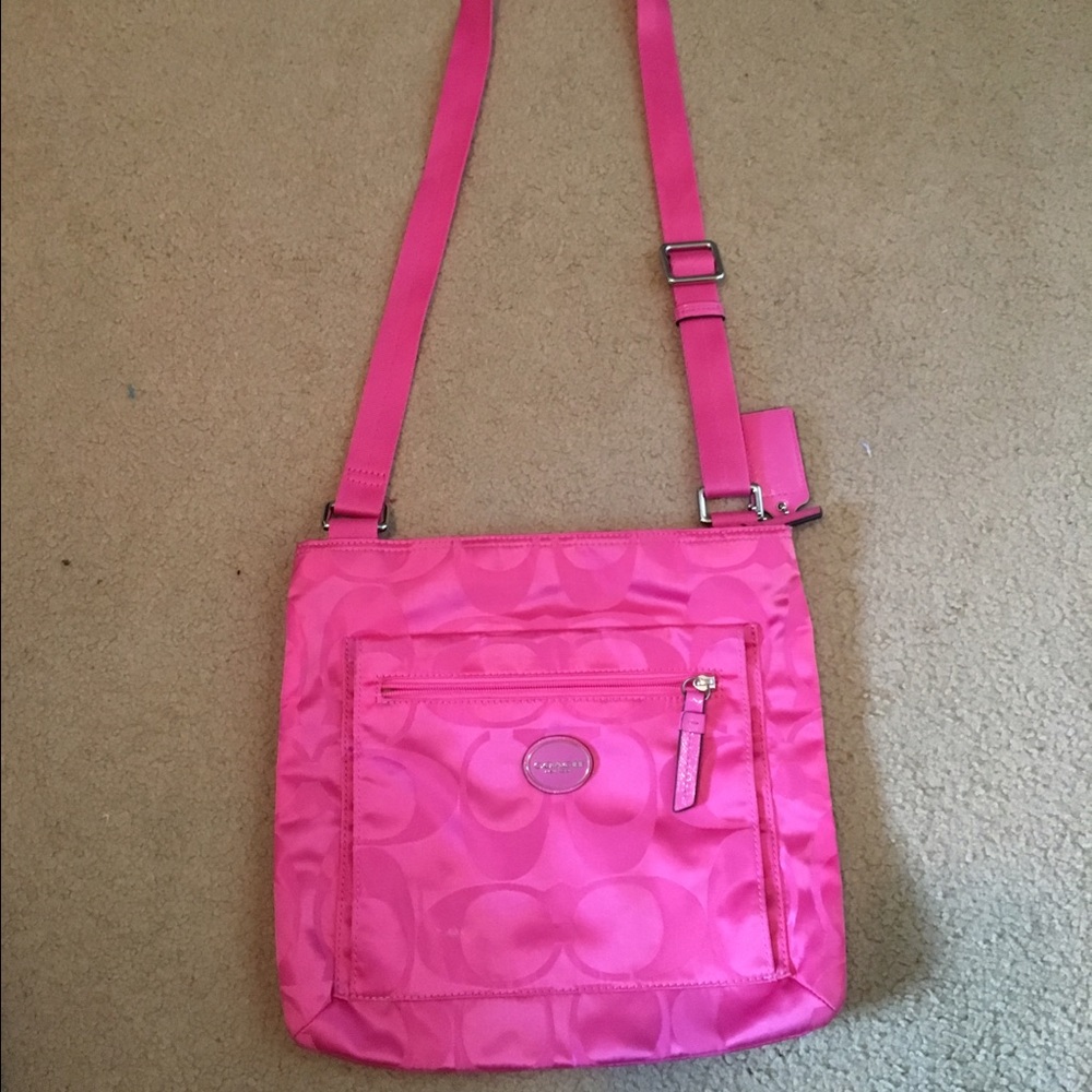 Pink cross body coach purse