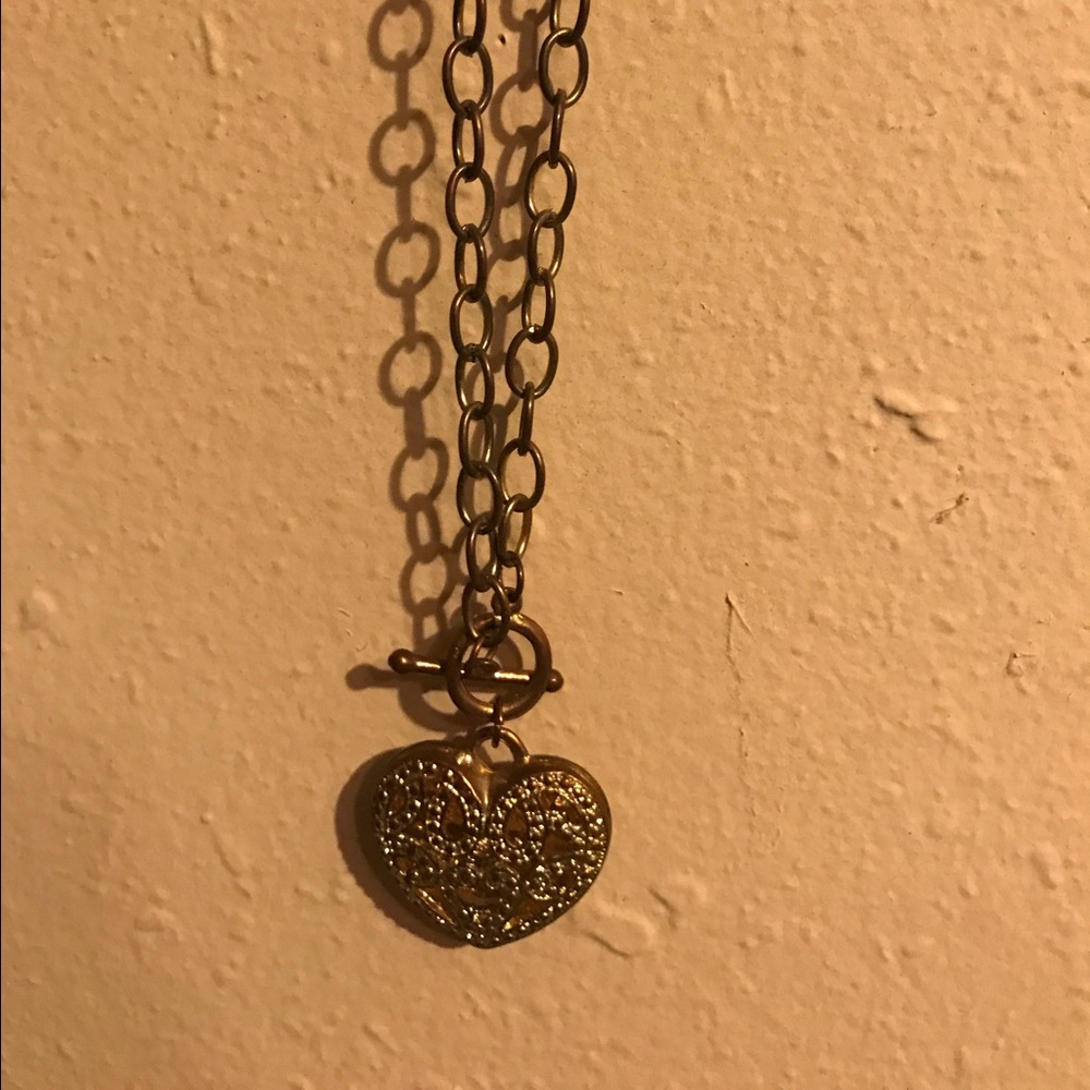 Gold heart shaped charm necklace