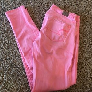 Neon pink American Eagle skinny jeans