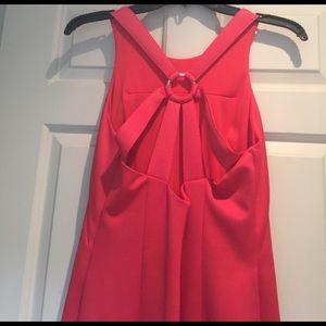 Below the knee, coral open back dress 👗