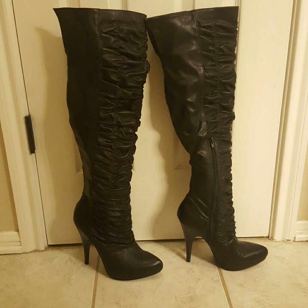 *make an offer* Carlos Santana over knee boots
