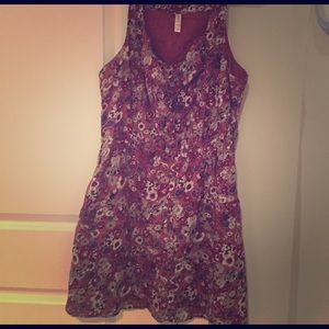 Knee length rose/burgundy floral dress.