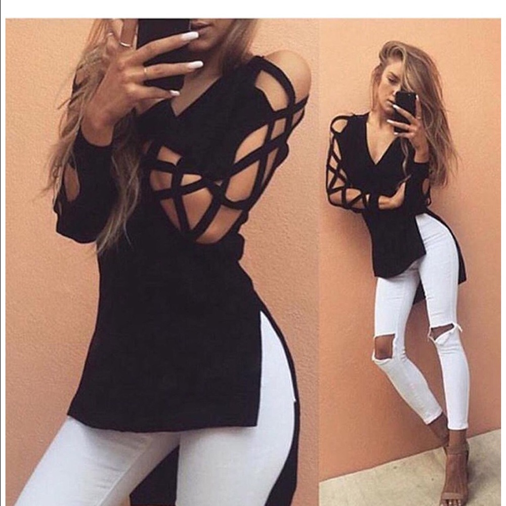 Hollow Sleeve Casual Blouse runs small like a L