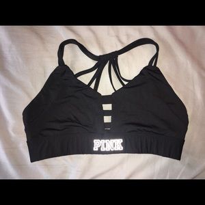 Two PINK sports bras