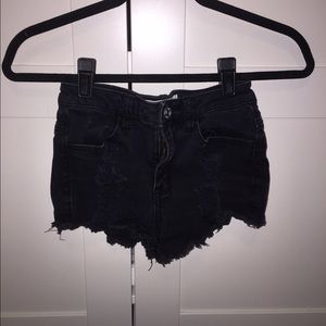 Black ripped shorts