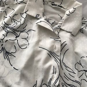 Ecru blouse with black pattern