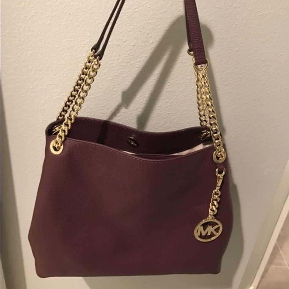 New never used Michael Kors Medium  Plum Purse