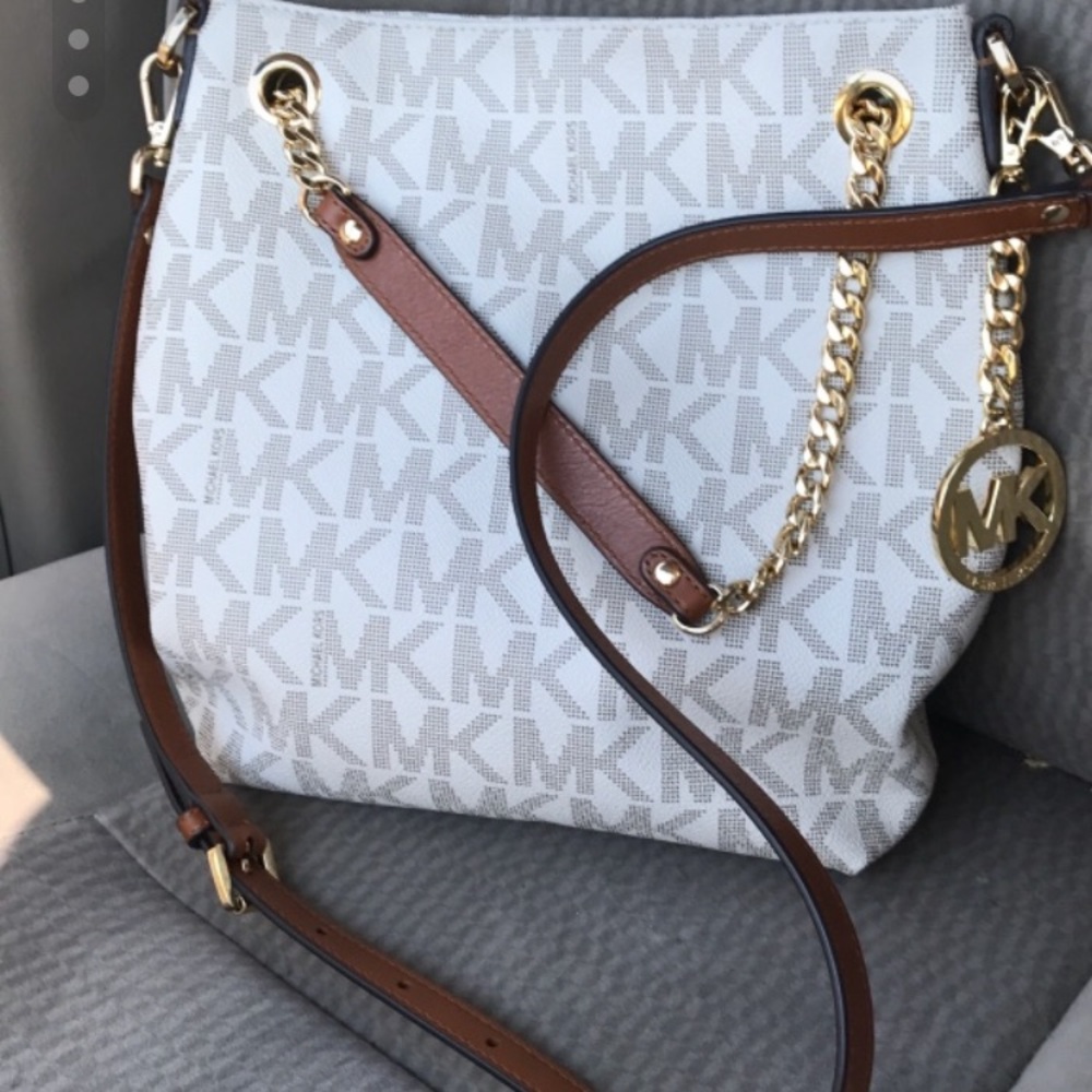 Brown and white MK purse cross body/ hand bag
