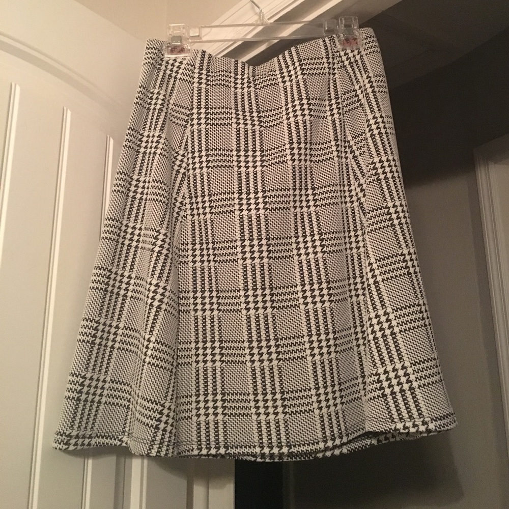 Black and white plaid a-line skirt, size 4