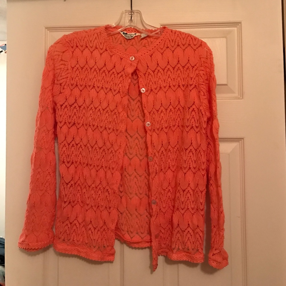 Dark peach sweater.