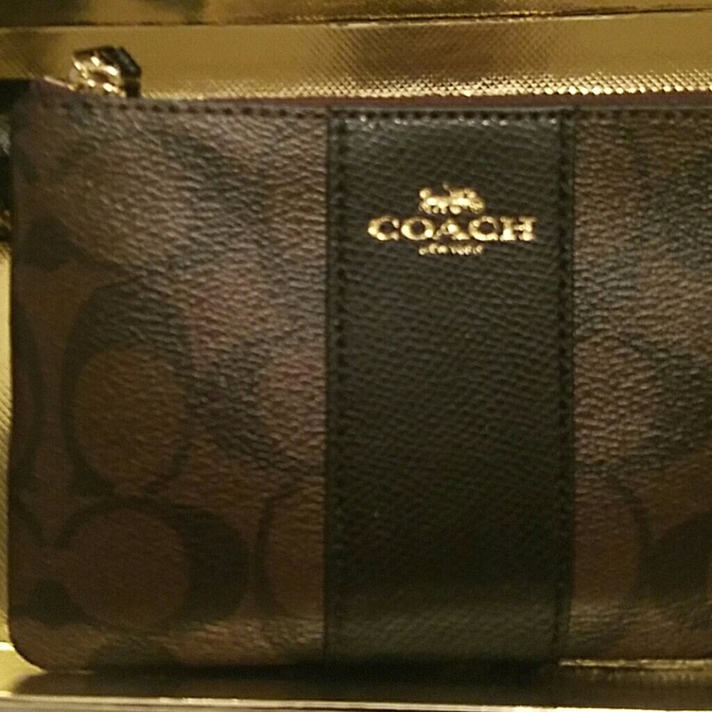 Brand new authentic Coach leather wristlet