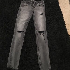 American Eagle Outfitters distressed jeans.