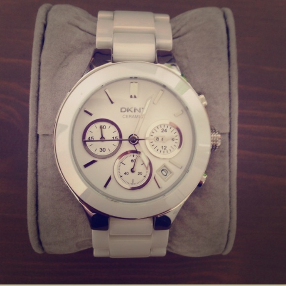 DKNY white ceramic watch. Needs battery.