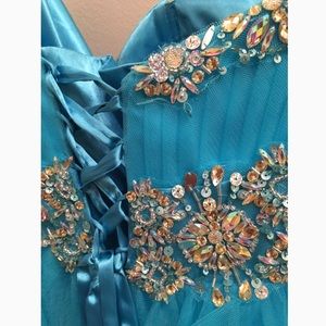 Blue short strapless corset style party dress