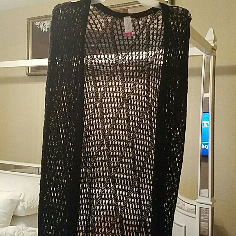 Long sleeveless sweater