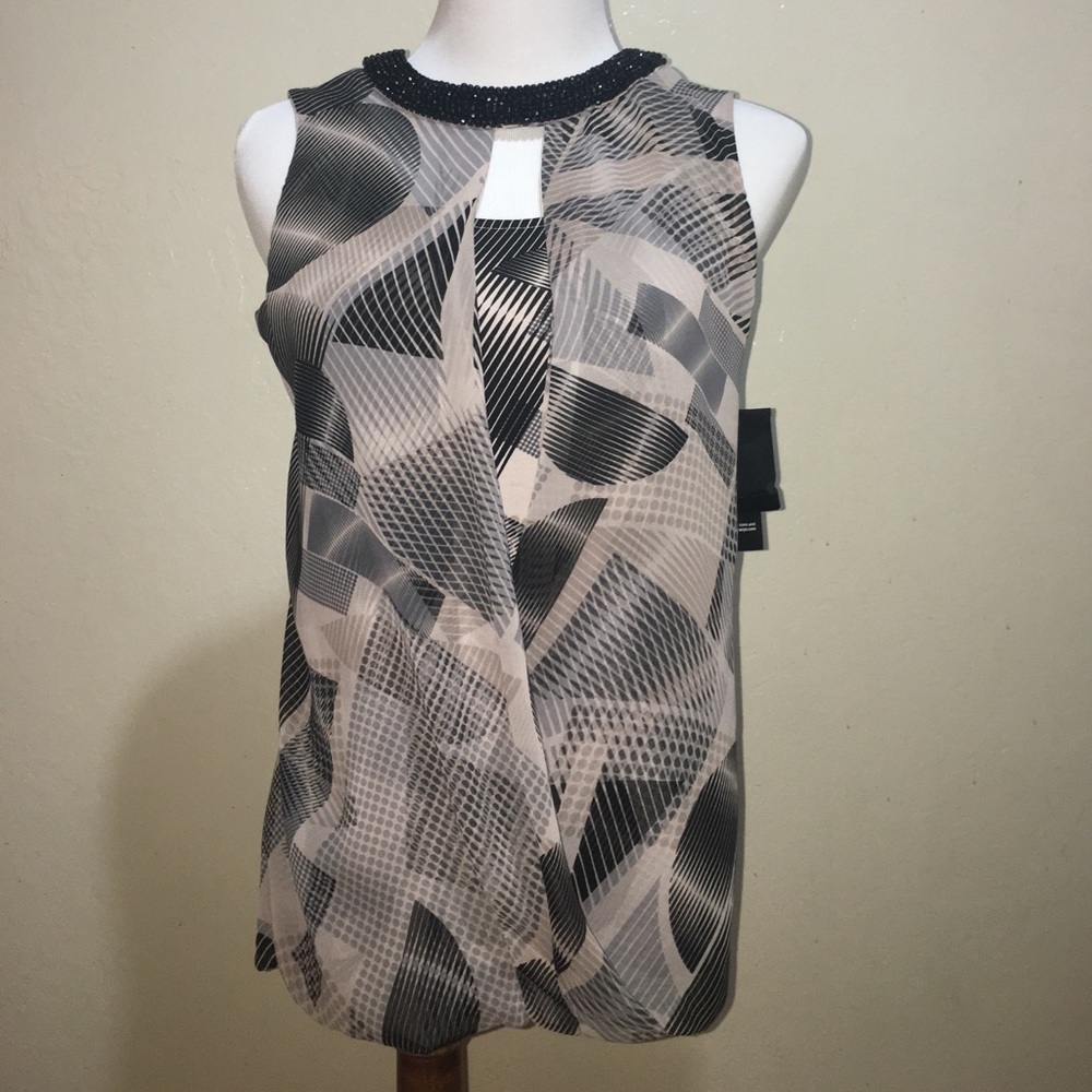 Beautiful sleeveless drape blouse