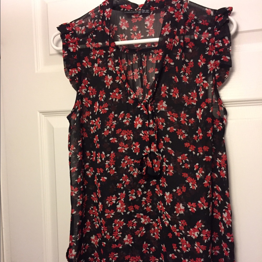 Sheer sleeveless pattern blouse with bow