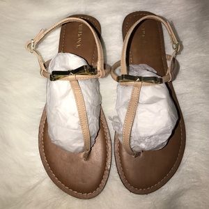 Gladiator sandals with gold bow