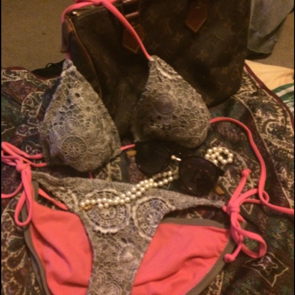String bikini. Top small, bottoms medium.