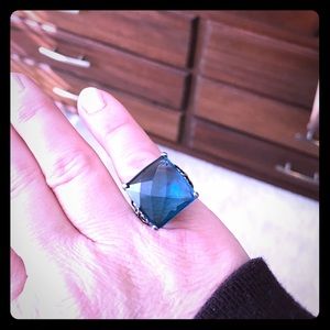 Stainless steel and blue topaz ring