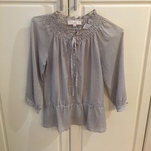 Black and white patterned blouse