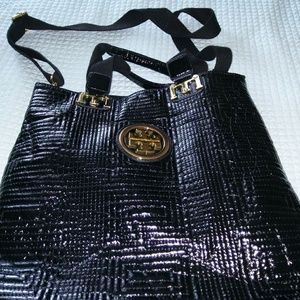 Tory Burch bag 14 inches h and 15 inch.w