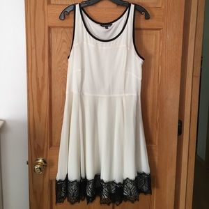 Off white dress with black lace accent