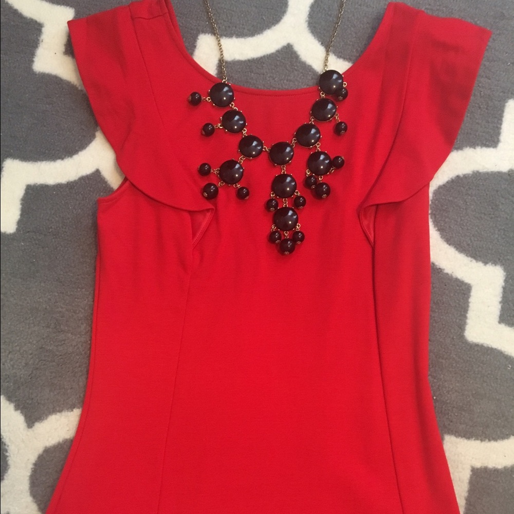 Express super cute ruffled cap sleeves shirt.