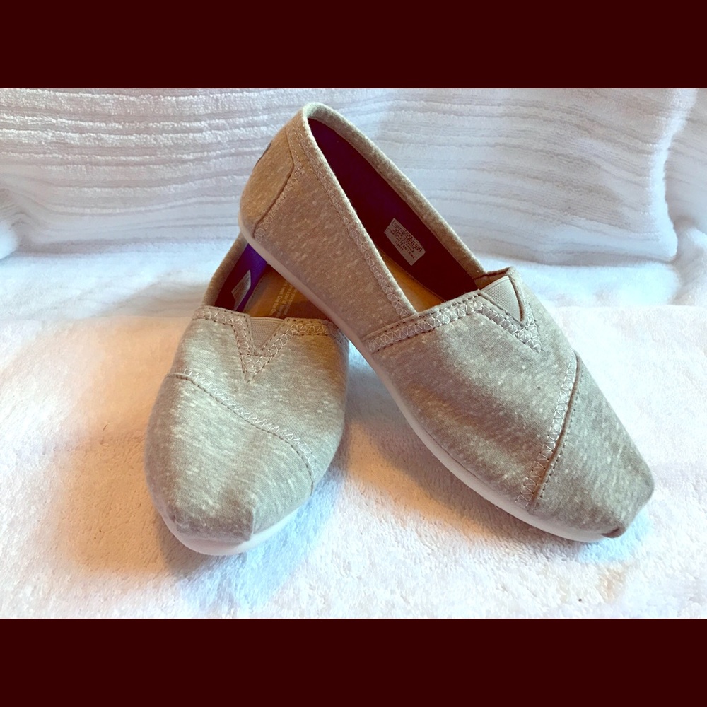 TOMS grey slip-ons