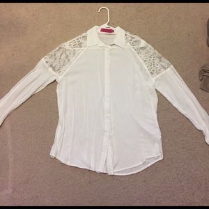 Long sleeve button up blouse with lace detail