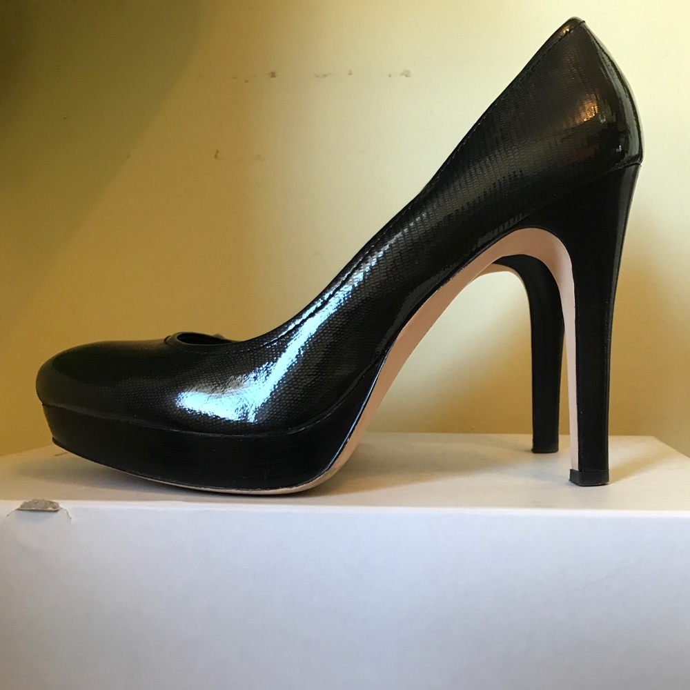 Lizard embossed patent platform stilettos.