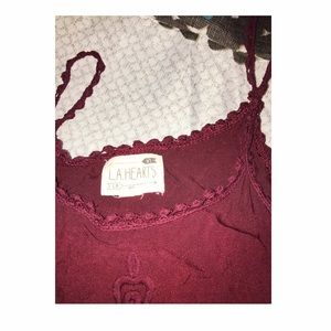 A burgundy lace shirt