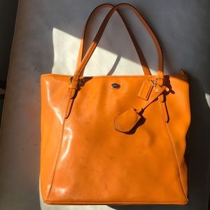 Embossed orange Coach bag