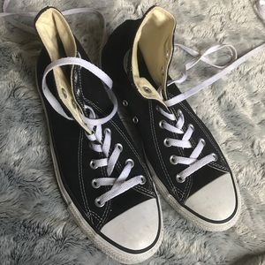 High top Converse Chuck Taylor all stars.