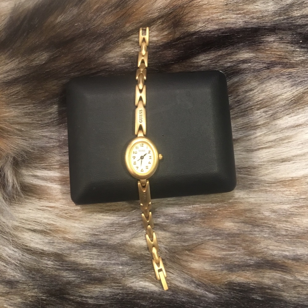Guess ladies watch. Brushed gold