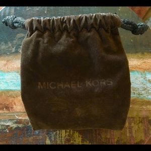 Authentic Michael Kors Brown Suede Jewelry Bag.