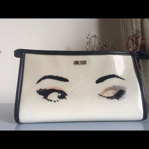 Kate Spade winking makeup bag/traveling bag