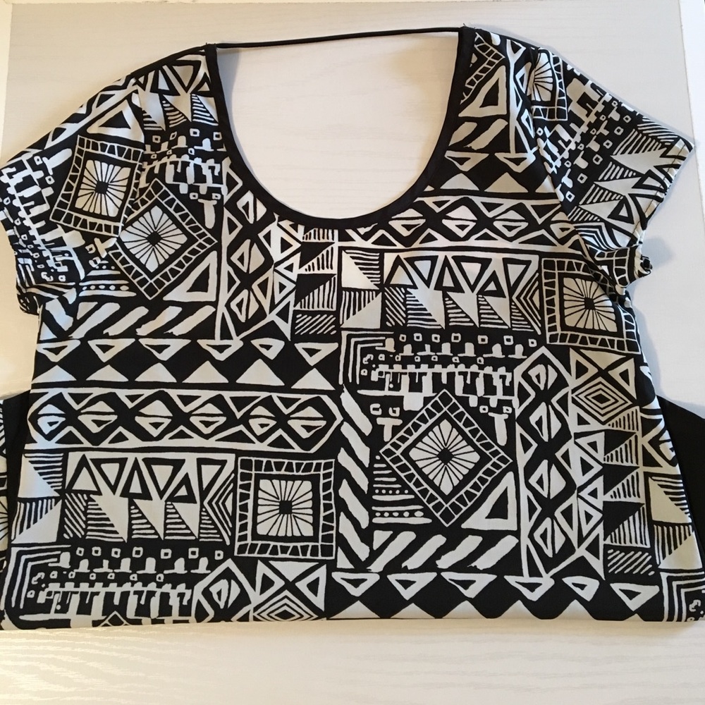 Top has black back, black & white design on front