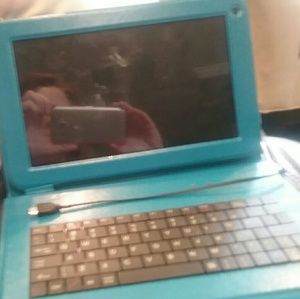 Fold over tablet. With attached keyboard.