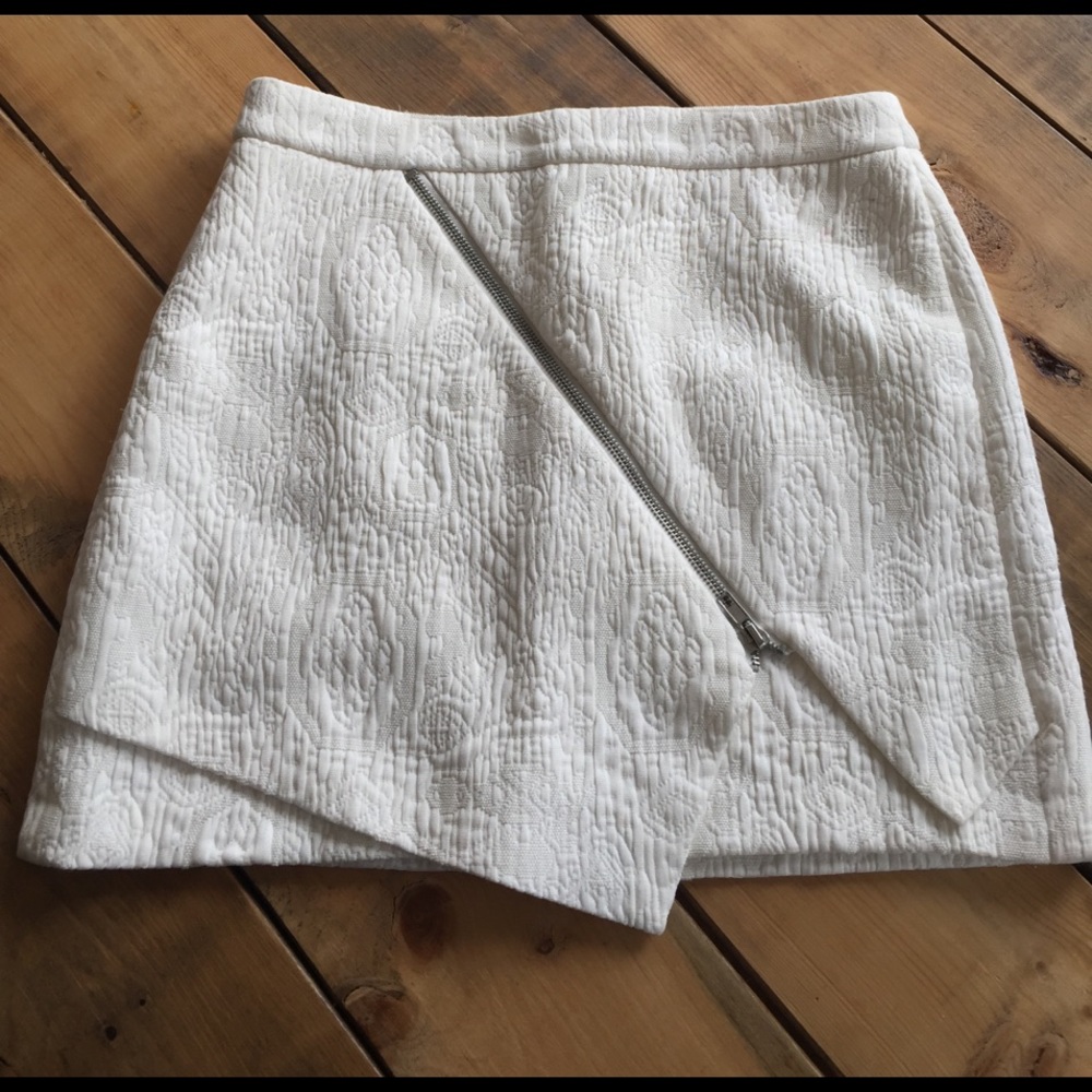 White asymmetrical mini skirt