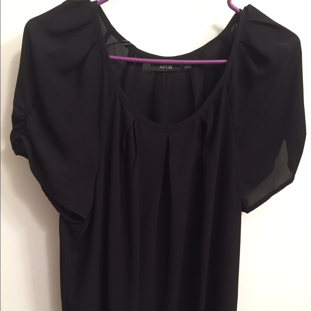 Black top with pleats on it
