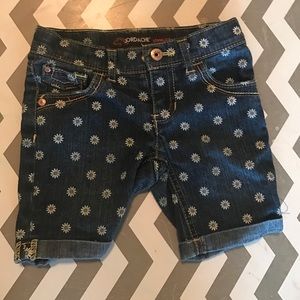 Blue jean shorts with daisies