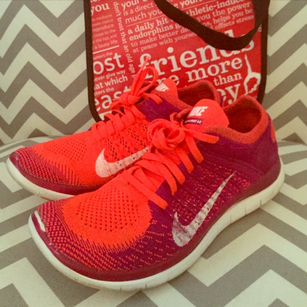 Nike Flyknit Free RN Women's Size 8 orange purple