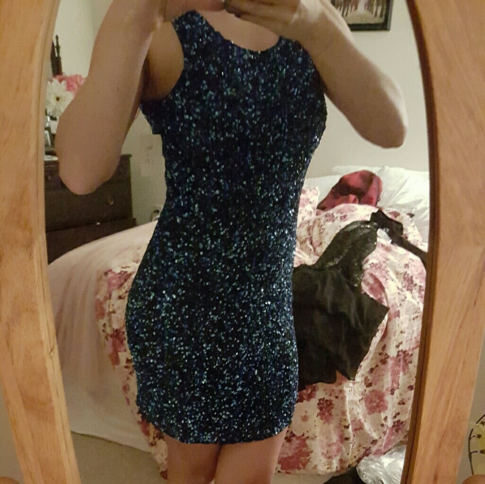 Parker sleeveless sequin dress with scoop back.
