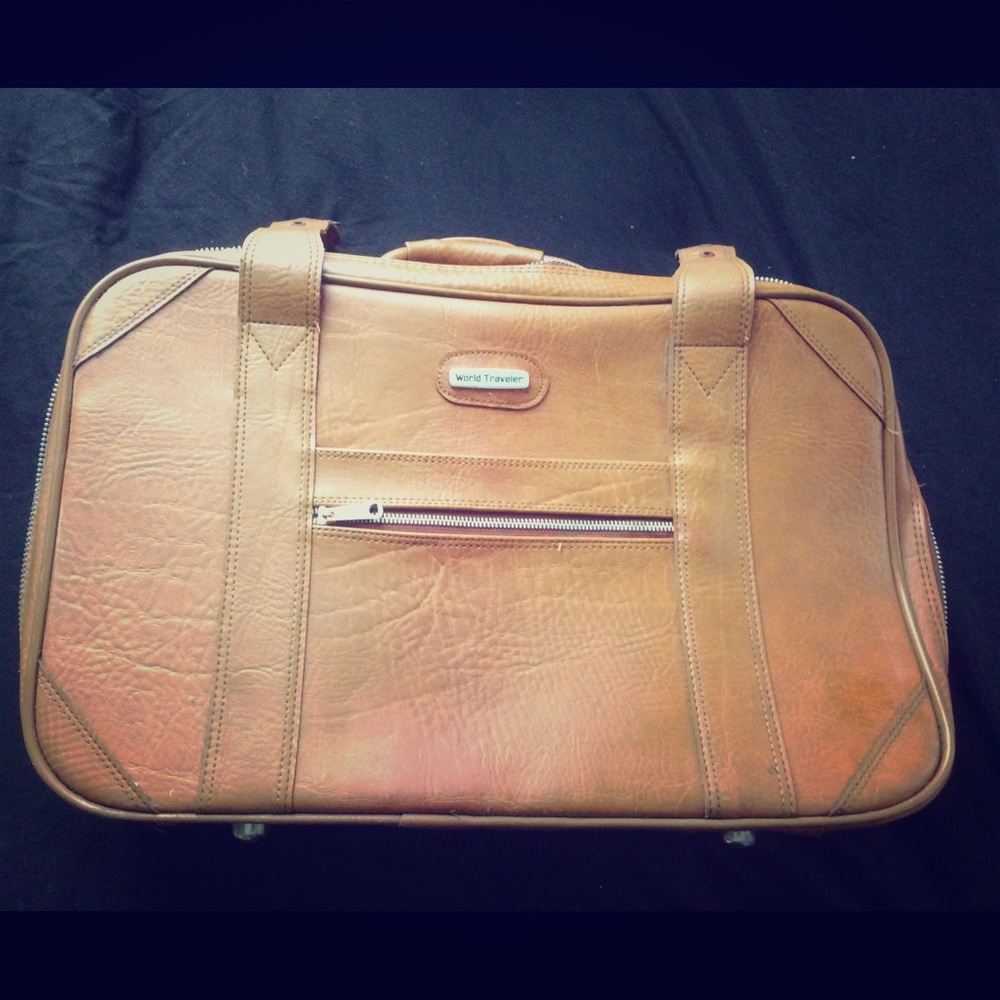 Vintage Leather feel World Traveler Suitcase.