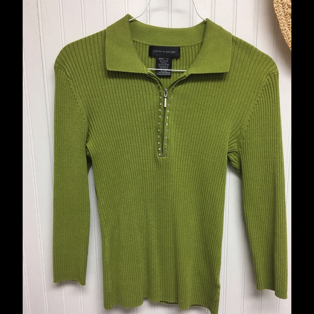 Sweater like new.  Love the zipper effect.