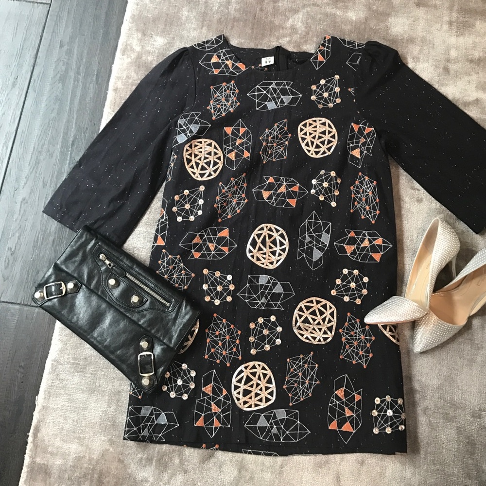 AMAZING DRess with abstract detail. Check it out!