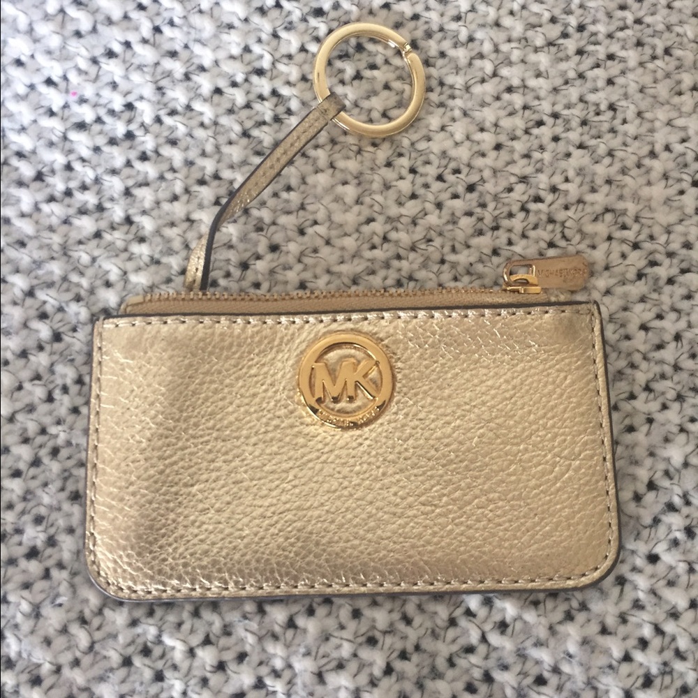Authentic Michael Kors gold coin purse